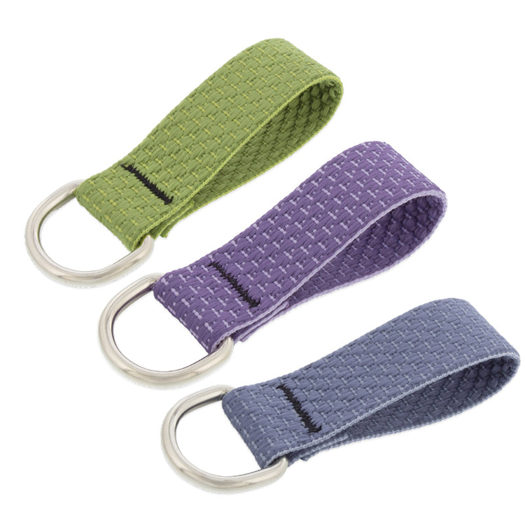 Eco Collar Buddy for dog tags in assorted colors on a white background. 