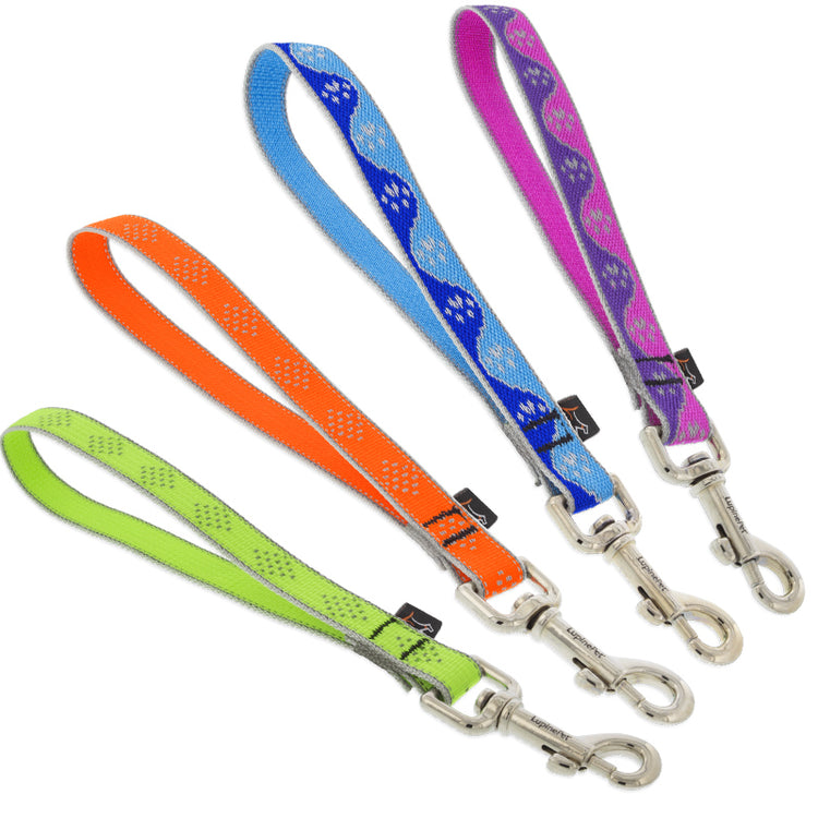 Dog leash training tabs extra short leash in assorted Reflective colors and designs on a white background