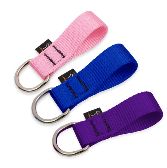 The Collar Buddy Dog Collar d-ring extender in LupinePet Basic Solids colors. Available in all three widths.